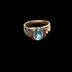 Vintage estate blue topaz ring with diamond accents